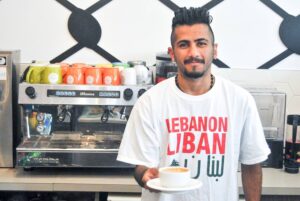 Server wearing Lebanon t-shirt